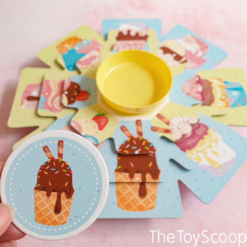 Completing A Lets Learn Carousel Ice Cream Picture by lining up all three images on the carousel
